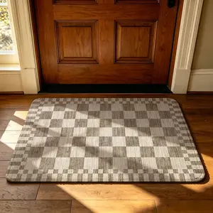 A rectangular three-dimensional relief square-patterned entryway floor mat, with a non-slip felt and silicone lining around the edges. The mat is soft and can be machine-washed, suitable for use as a dirt-resistant mat at the entrance, in bedrooms,