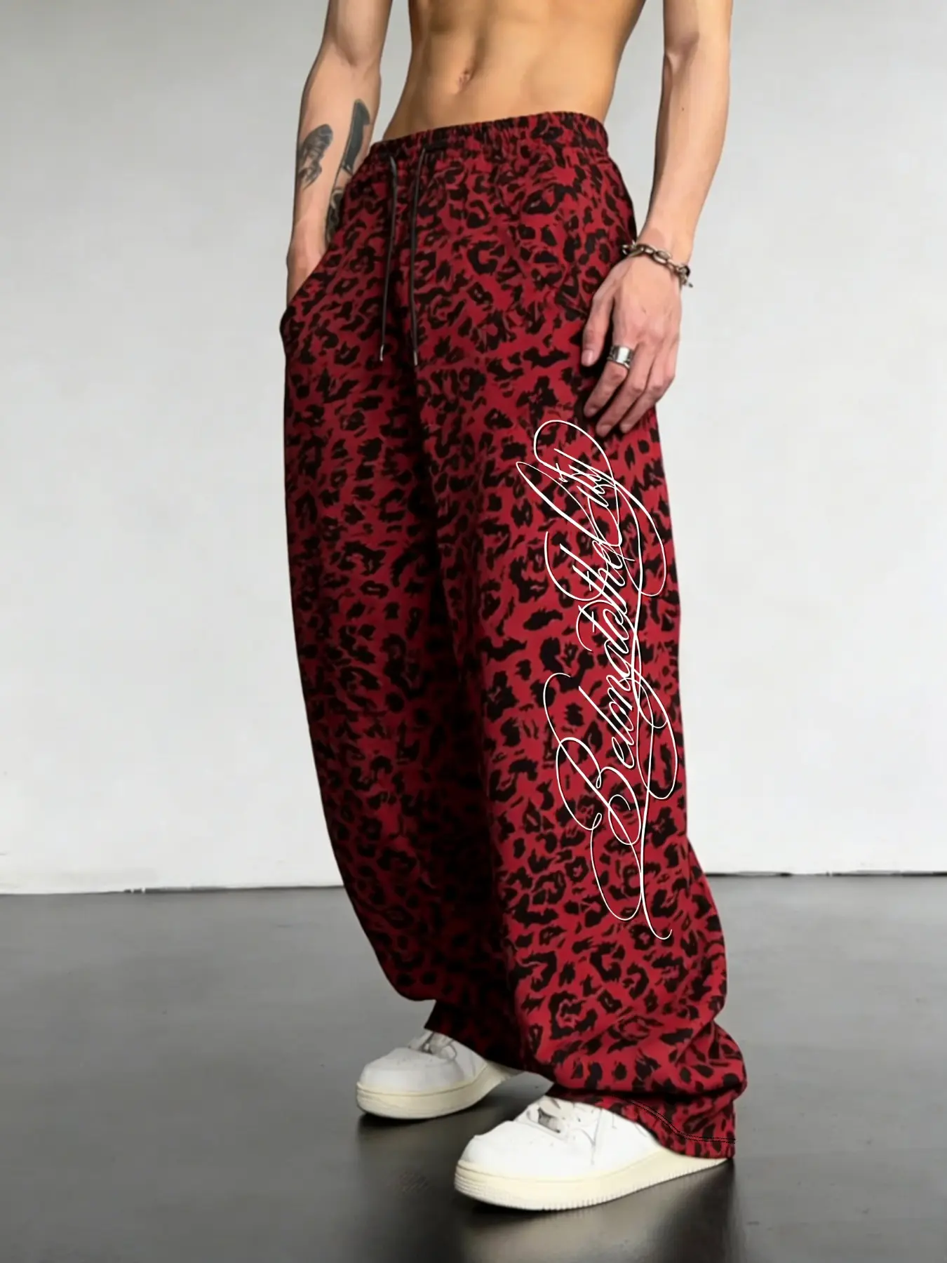 Y2K Grunge Red Leopard Print Sweatpants Men Women Oversized Baggy Track Pants with Graphic Script Hip Hop Streetwear Athleisure Style Bottoms Slouchy Wide Leg Joggers for Casual OOTD Dance Practice