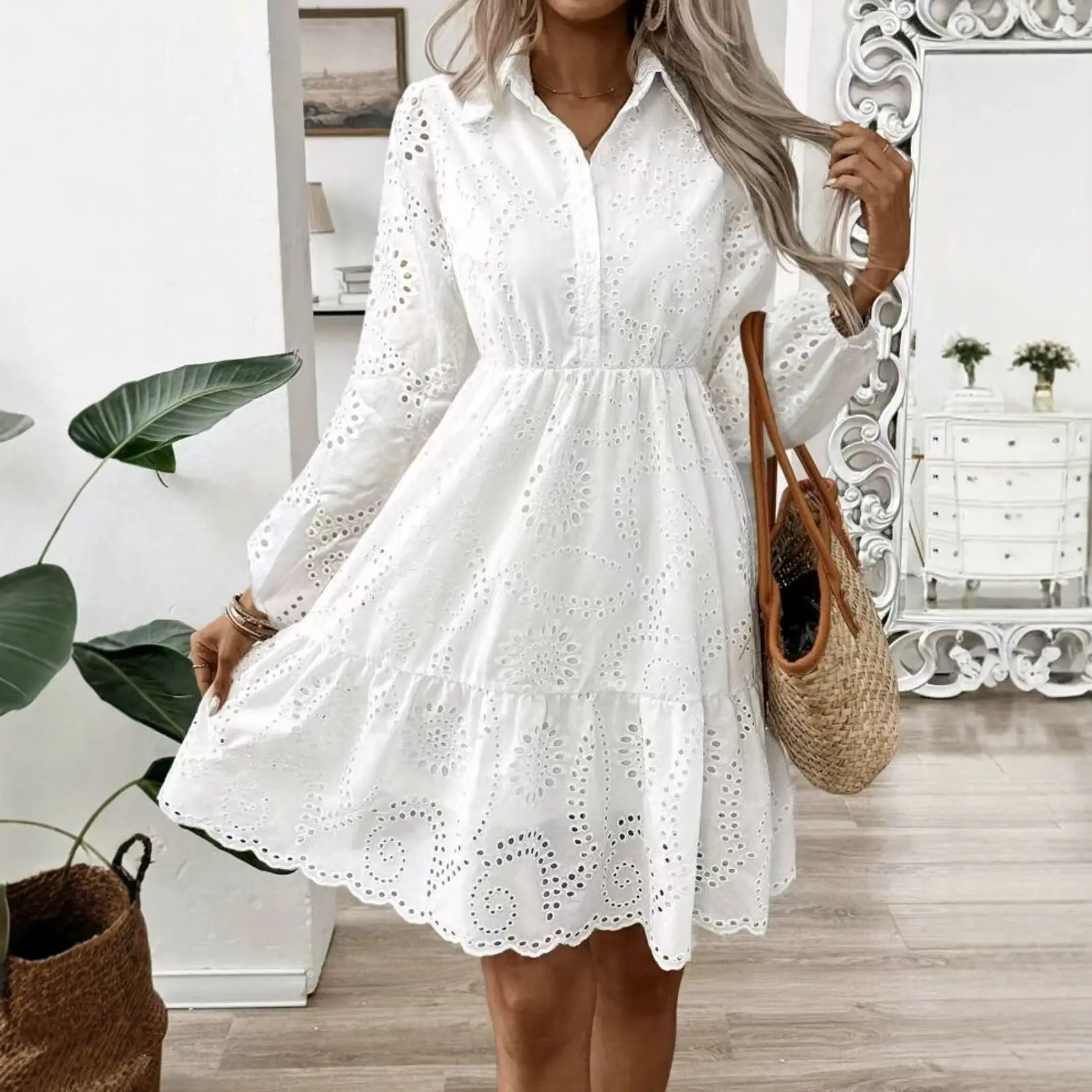 The new women's shirt with a white long-sleeved embroidered dress collar