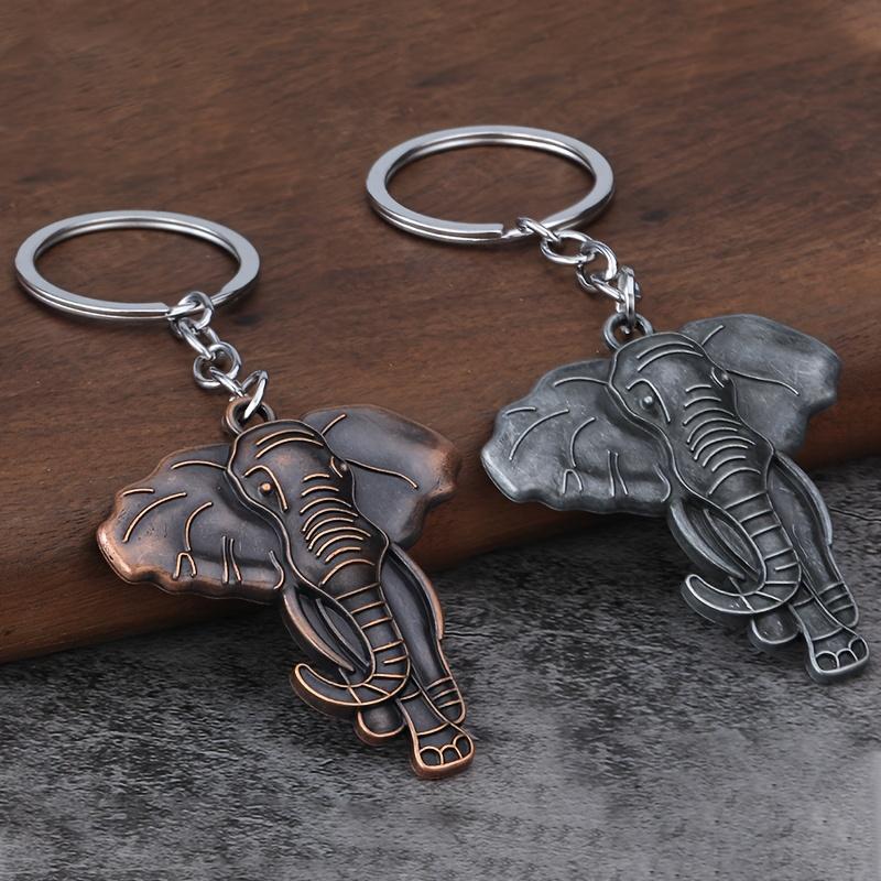 1. Vintage Zinc Alloy Elephant Keychain — Animal-Themed Key Ring. This keychain serves as a bag charm, travel souvenir, or gift.
