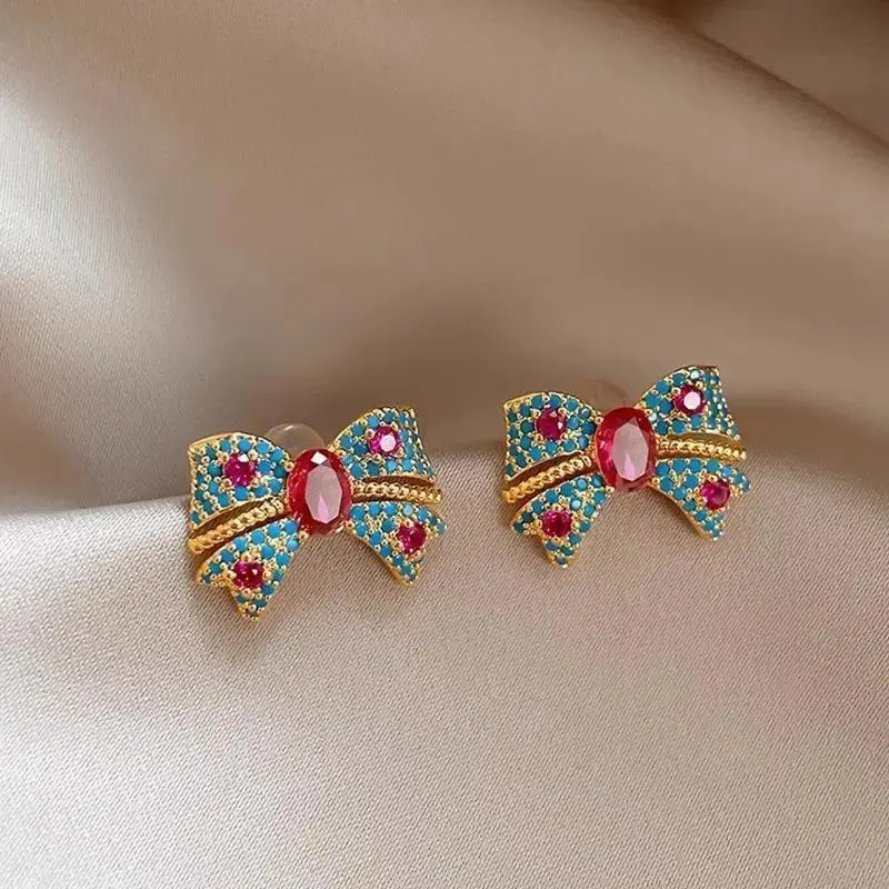 Vintage Romance Bow Stud Earrings for Women, Blue Synthetic Zirconia with Bling Effect, Lightweight Whimsical Jewelry, Anniversary Gift, Whimsical Earrings, Unisex, Blue Sparkly Embellished Earrings