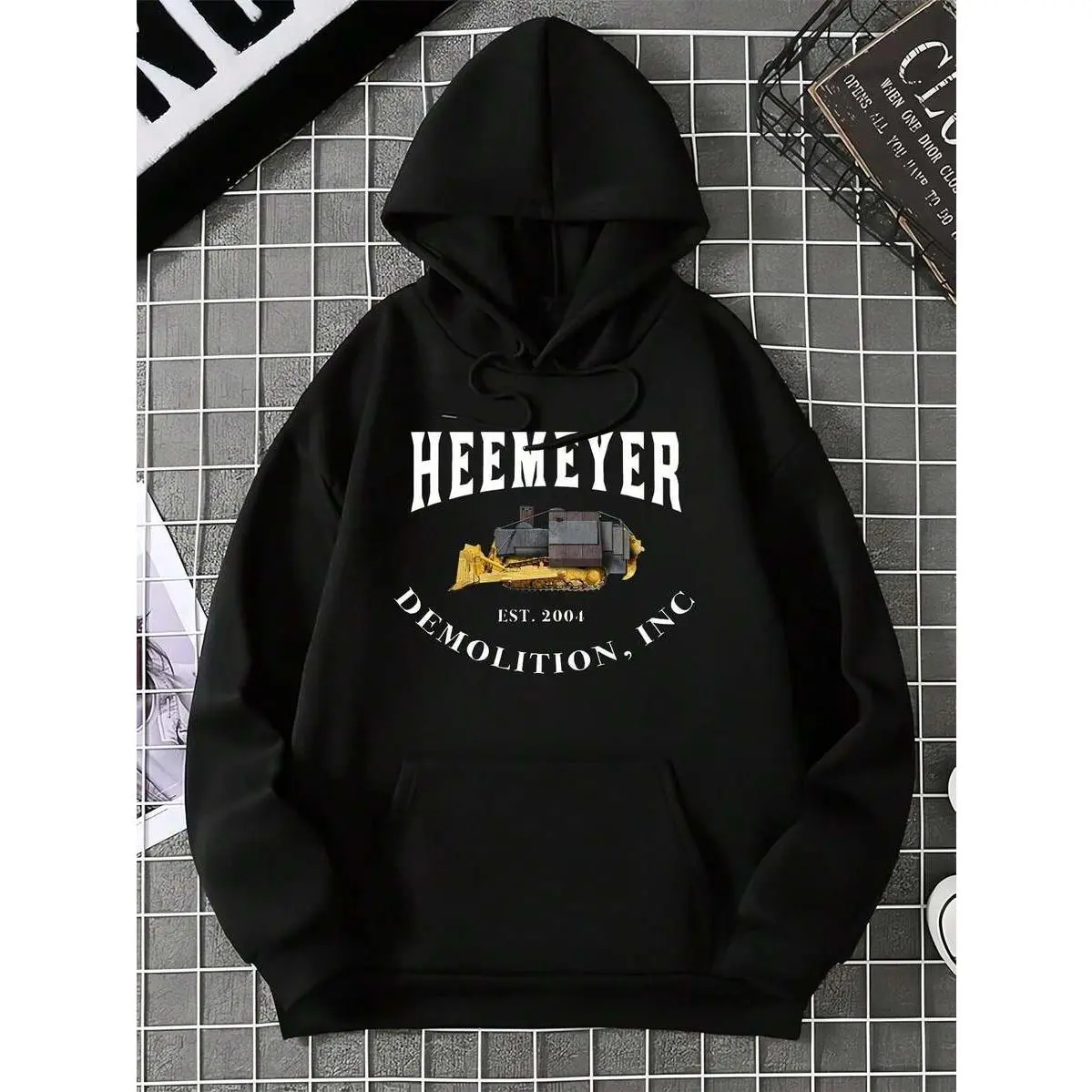 Men's Heemeyer EST 2004 Demolition Hoodie - Heavy bulldozer design, black cotton blend pullover with kangaroo pocket, machine washable, all-season comfort. Ideal gift for demolition workers & heavy equipment enthusiasts. Casual construction site wear, lon