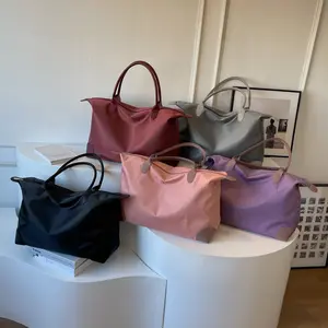 Large-capacity travel handbag 2026 new model simple versatile shoulder bag waterproof Oxford cloth tote bag