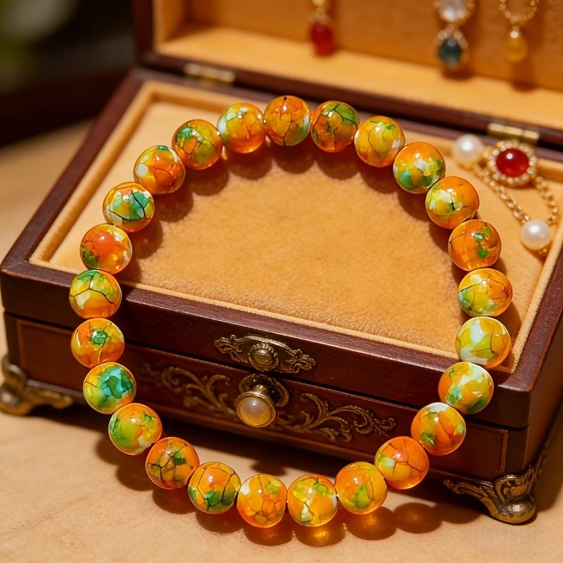 [Rain Flower Stone Bracelet] A Smooth Orange-Yellow Rain Flower Stone Bracelet That Attracts Wealth, Handcrafted And Elastic, Symbolizes Fortune And Luck, Suitable for Both Men And Women, Perfect for Everyday Wear And As a Gift