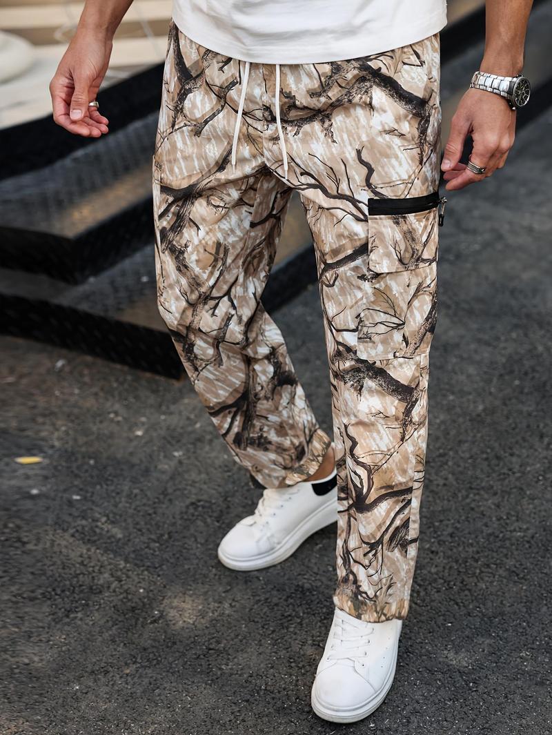 Men's camouflage print zippered pocket trousers, slim-fit athletic pants, durable trousers for autumn, men's wear-resistant outdoor training pants, streetwear fashion, vacation wear, men's clothing