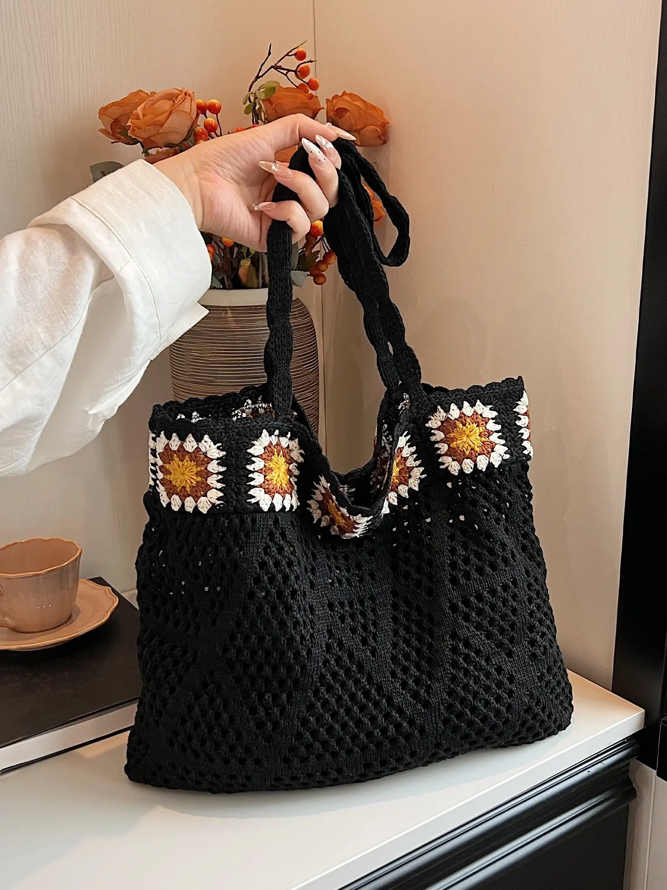 1pc Ladies' retro patchwork crochet tote bag, with a forest style casual style, featuring hollowed out weaving and daisy edging, loose and large capacity, suitable for girls' daily shopping, vacation and commuting storage.