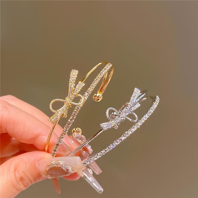 Elegant Gold Bow Bracelet with Synthetic Cubic Zirconia Inlay, Women's Open Design Bracelet for Casual and Special Occasions