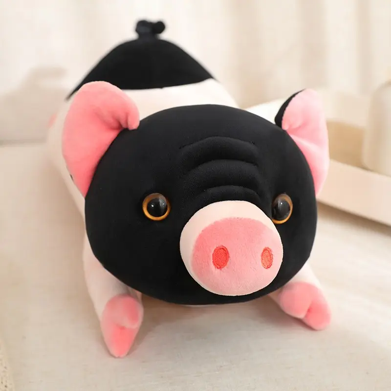 A pink, adorable plush toy of a small fragrant piglet,a cute little creature with black hair,dark bean-shaped eyes,and pink claws.A long, soft sofa pillow.A perfect gift for a girlfriend’s sleep companion,perfect for Christmas,birthdays,special occasions.