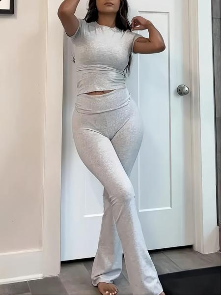 A women's round neck short sleeved top and high waisted micro flared pants solid color two-piece set, suitable for daily home commuting and going out