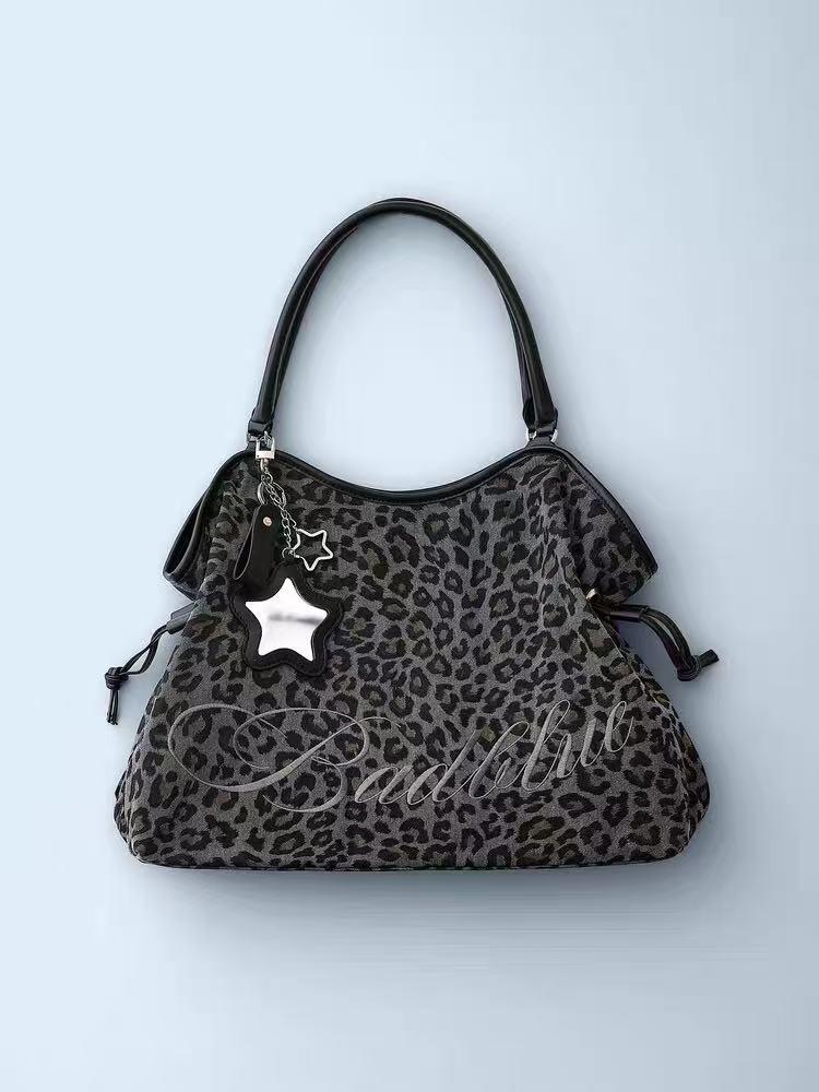 BadBlue, a Korean brand known for its niche, forest-inspired leopard print dot pattern, business-ready bag with a trendy, sweet-