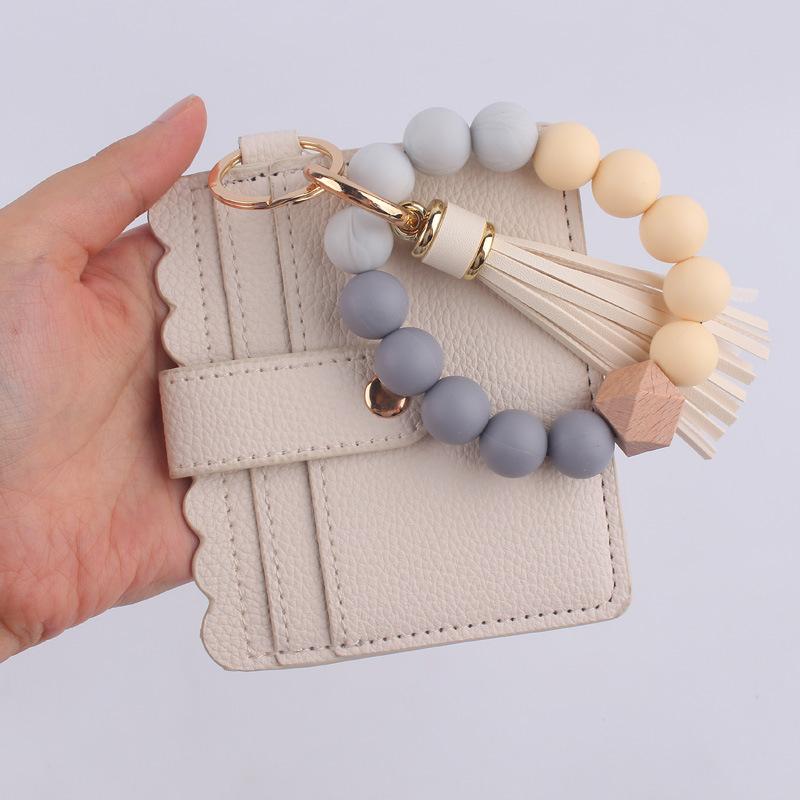 Silicone bead bracelet card holder accessories, silicone bead wristband, PU tassel women's wallet, leather tassel keychain