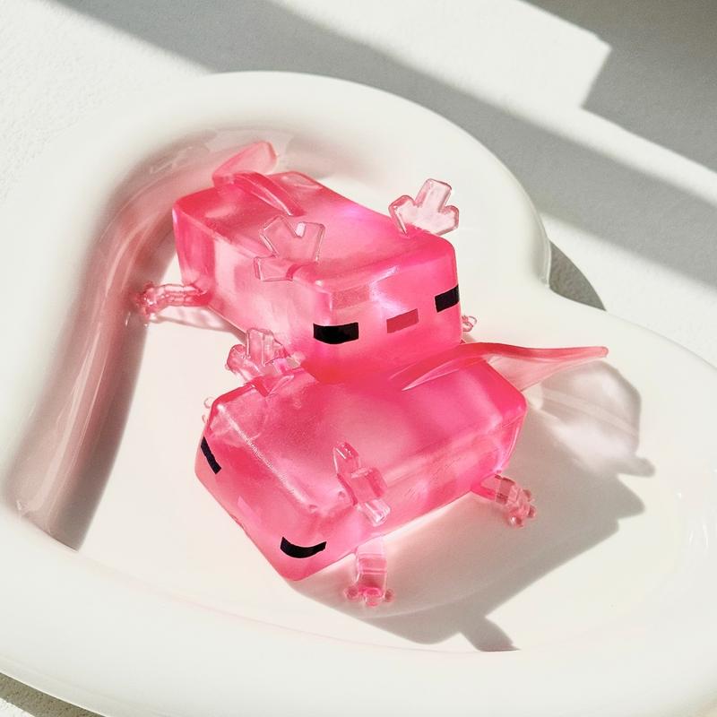Axolotl animal-shaped squishy toy, a popular internet trend, a stress-relieving gift and gadget.