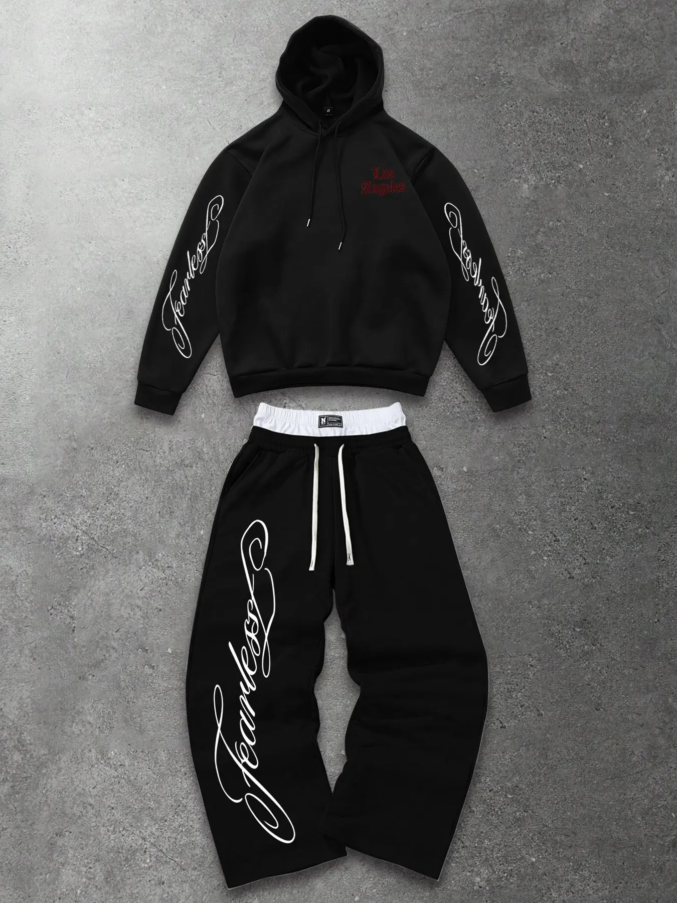 Men's Two‑Piece Set: Los‑Angeles‑Script‑Print Hoodie & Wide‑Leg Sweatpants. Made of soft fleece, breathable, stretchy and loose‑fitting for American street‑style outfits. Hoodie with script print on sleeves, matching sweatpants with dual‑white drawstring