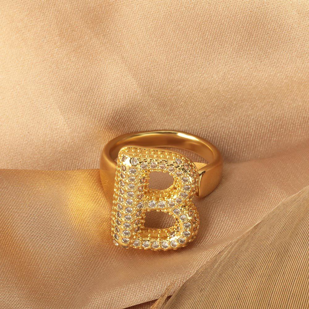Versatile 26-letter ring with copper inlay and zirconia, open design, niche light luxury, non-fading jewelry for women