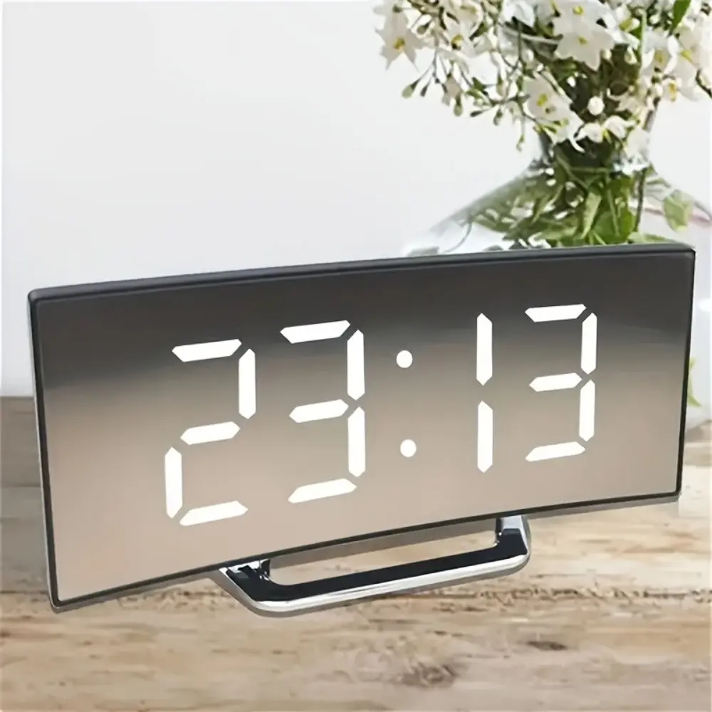 Modern curved digital clock, mirror alarm clock.Dual power options (battery or USB), large screen, stylish black home decoration design clock/minimalist alarm clock/living room wall clock.You need to bring your own 3 AAA batteries.