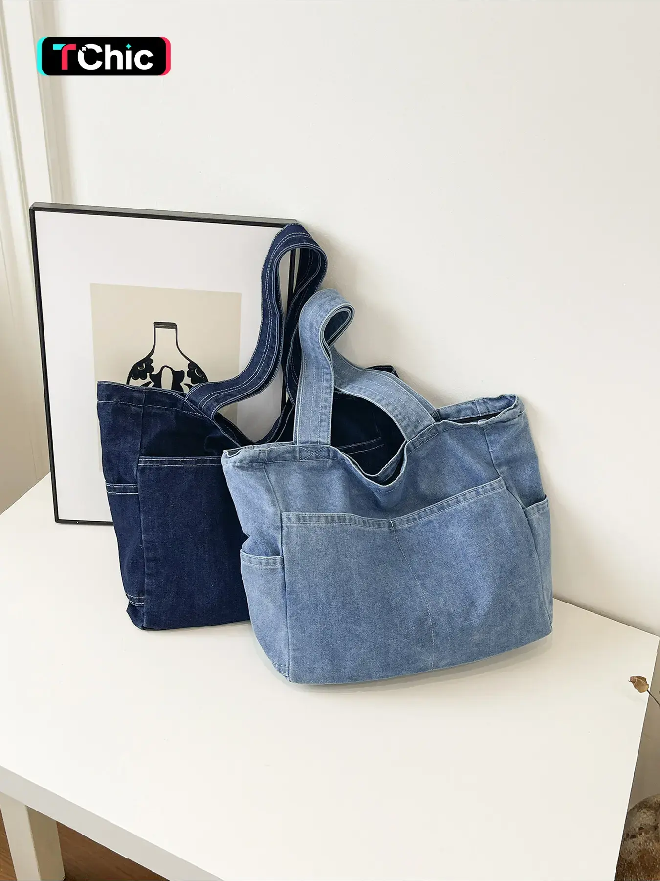 Front and back multiple external pockets lazy style tote bag, integrated elongated reinforced top handles, open wide large capacity interior, relaxed daily shoulder storage bag for commuting and classes