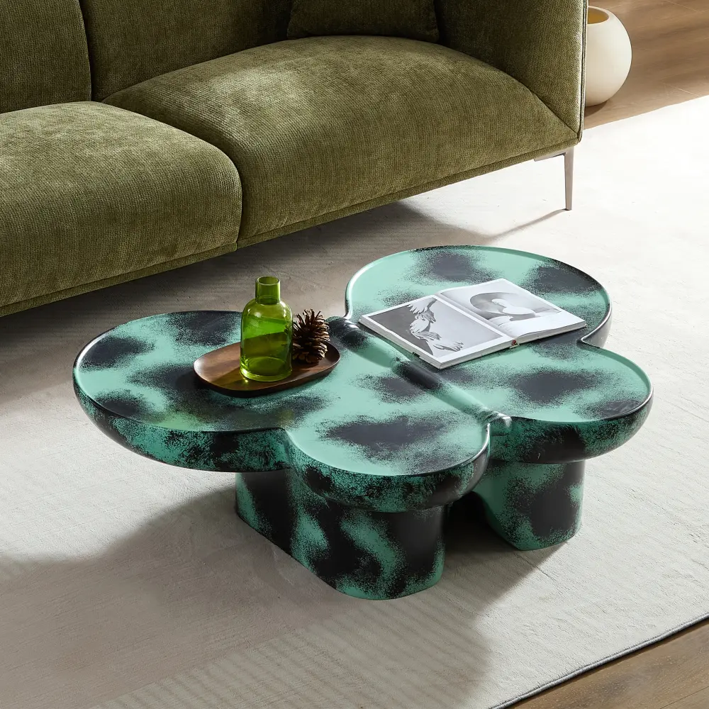 Butterfly-shaped coffee table. Made of fiberglass, its unique colors and design exude a vibrant artistic flair, easily becoming a visual focal point. A modern style coffee table with a faux travertine texture, suitable for living rooms and offices.