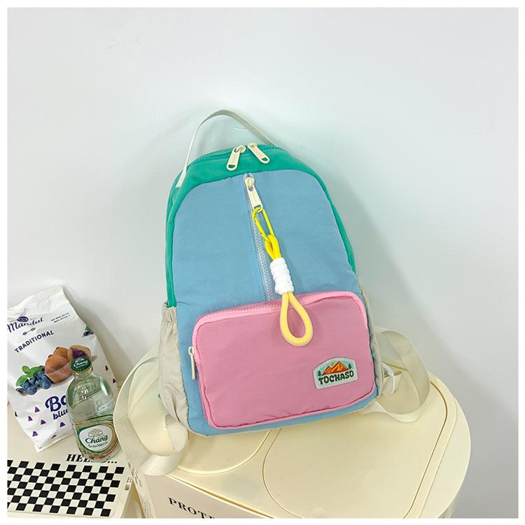 Boys' and girls' backpack 2026 new fashion color-blocking kindergarten baby school bag large capacity children's backpack