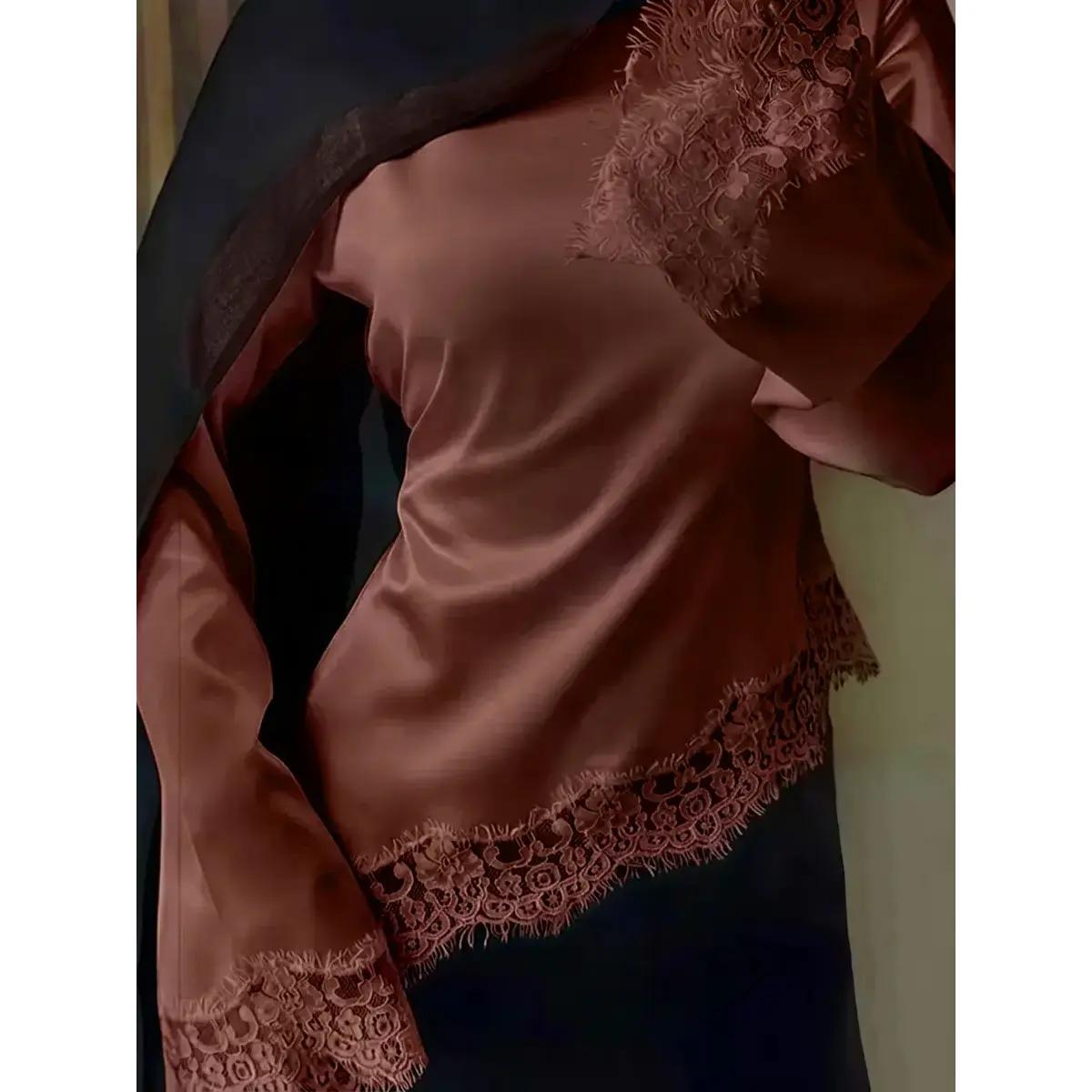 Lace trimmed satin lace up shirt