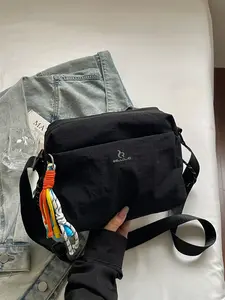 Women's Washed Nylon Crossbody Bag With Colorful Braided Charm, 6 Colors Crinkled Fabric Adjustable Wide Strap Shoulder Purse, Multi Zipper Pocket Water Resistant Phone Bag, Minimalist Japanese Style Casual Sling Bag for Commute Shopping Short Trip