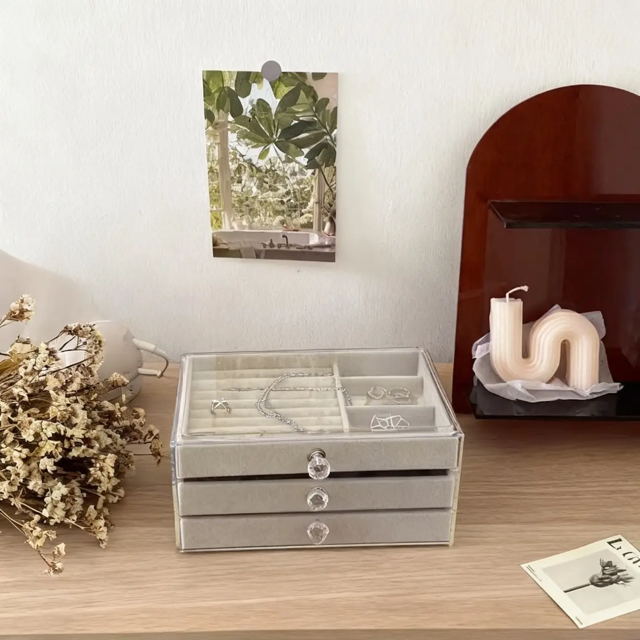 1 piece acrylic desktop storage box for miscellaneous items. Multi-functional layered storage box. Upper slot for items, lower double-layer multi-compartment drawer. Fabric lining for desktop use. Integrated storage box for desk supplies.