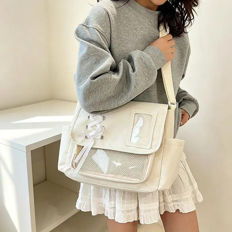 Stylish Canvas Shoulder Bag with a Zip Top, Designed in a Japanese School Style, Perfect for And Women. It Offers Ample Space for Casual Use And Can Be Used As a Trendy Crossbody Or Bookbag
