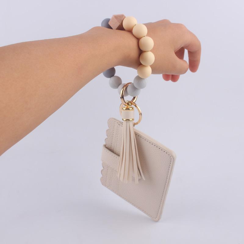 Silicone bead bracelet card holder accessories, silicone bead wristband, PU tassel women's wallet, leather tassel keychain