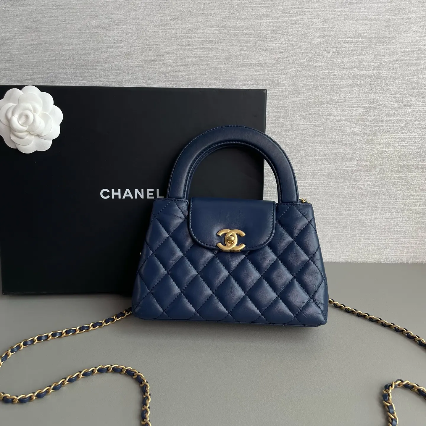 Pre-owned Chanel 2023 2024 Navy Blue Quilted Calfskin Mini Kelly Shopping Bag with Aged Gold Hardware SC079