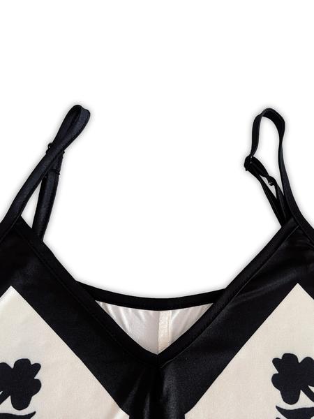 Women's casual seaside vacation loose spaghetti strap V-neck long printed dress, perfect for going out or wearing on the beach