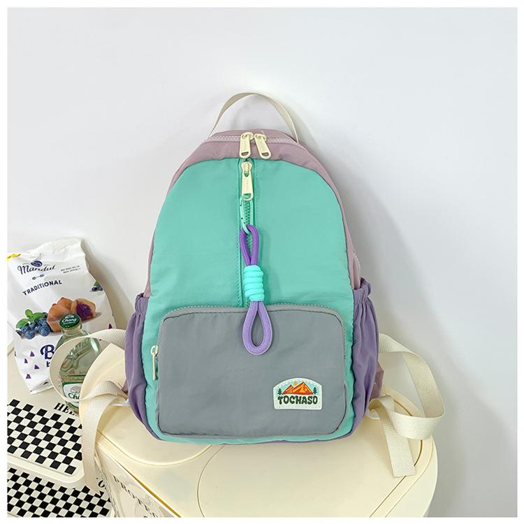 Boys' and girls' backpack 2026 new fashion color-blocking kindergarten baby school bag large capacity children's backpack
