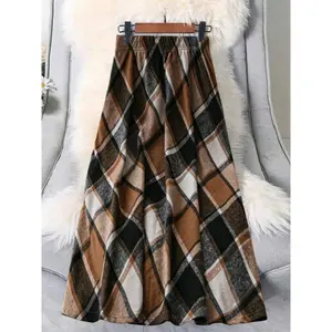 A women's brown checkered plaid Woven stretch waist A-line midi skirt, perfect for fall/winter, slimming and versatile Fit, Knitted Chic, Cold Weather, Soft Touch, Relaxed Fit, Power Outfit, Work Appropriate