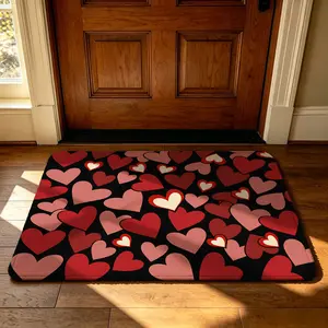 A rectangular doormat with a heart pattern, featuring a soft silicone fleece border that prevents slipping. It can be machine-washed and is suitable for use as a dirt-resistant mat at the entrance, in bedrooms, bathrooms, or beside the bed for bare