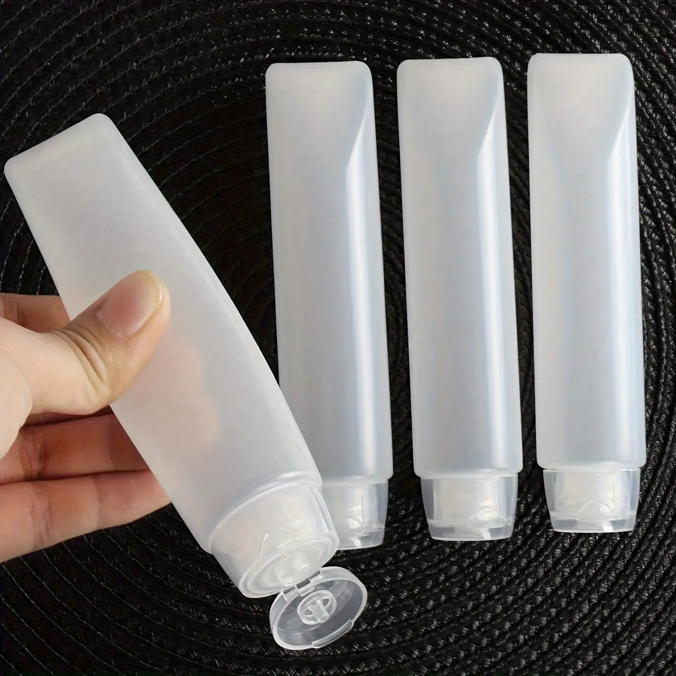Four-Piece Portable Travel Dispenser Bottles, Reusable Makeup Containers, Convenient Travel Shower Dispensers, Ideal for On-The-Go Use