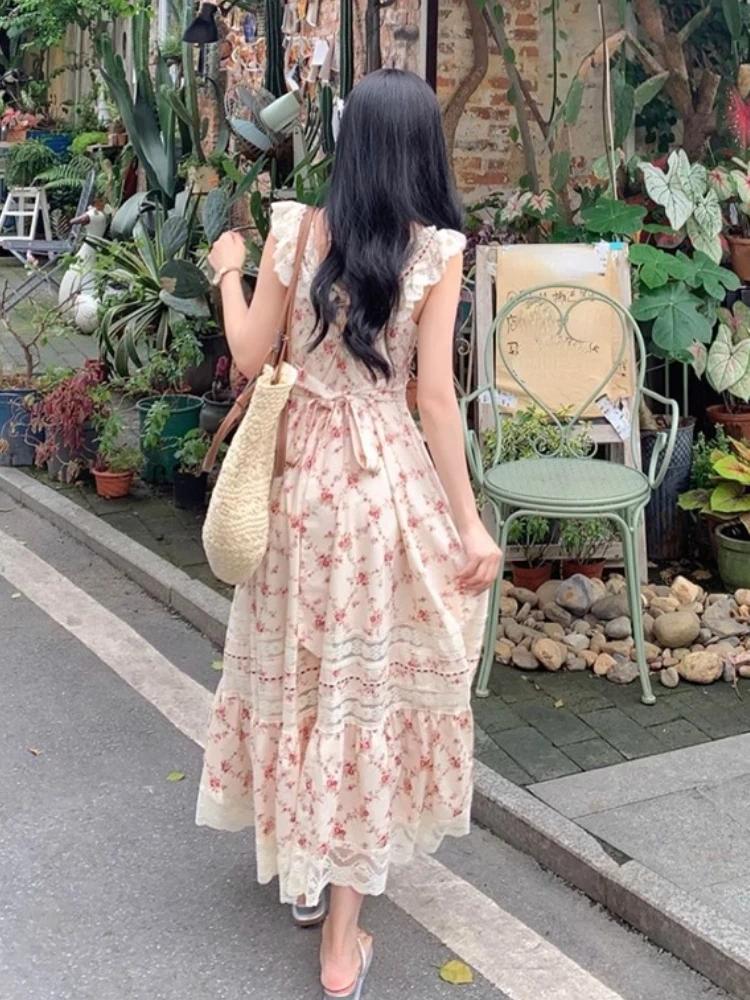 french elegant floral midi dress Teana French Floral Wrap Midi Dress in Tencel Blend L main image 1