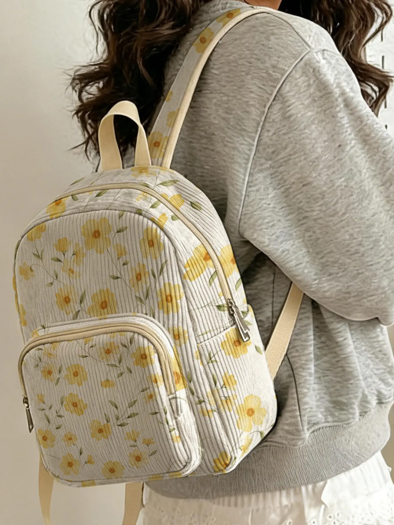 Fresh Light Yellow Ditsy Floral With Leaves And Stems 2D Print, Corduroy textured, multi compartment storage. Great for school and short trips, stylish and practical. Multi Compartment Backpack
