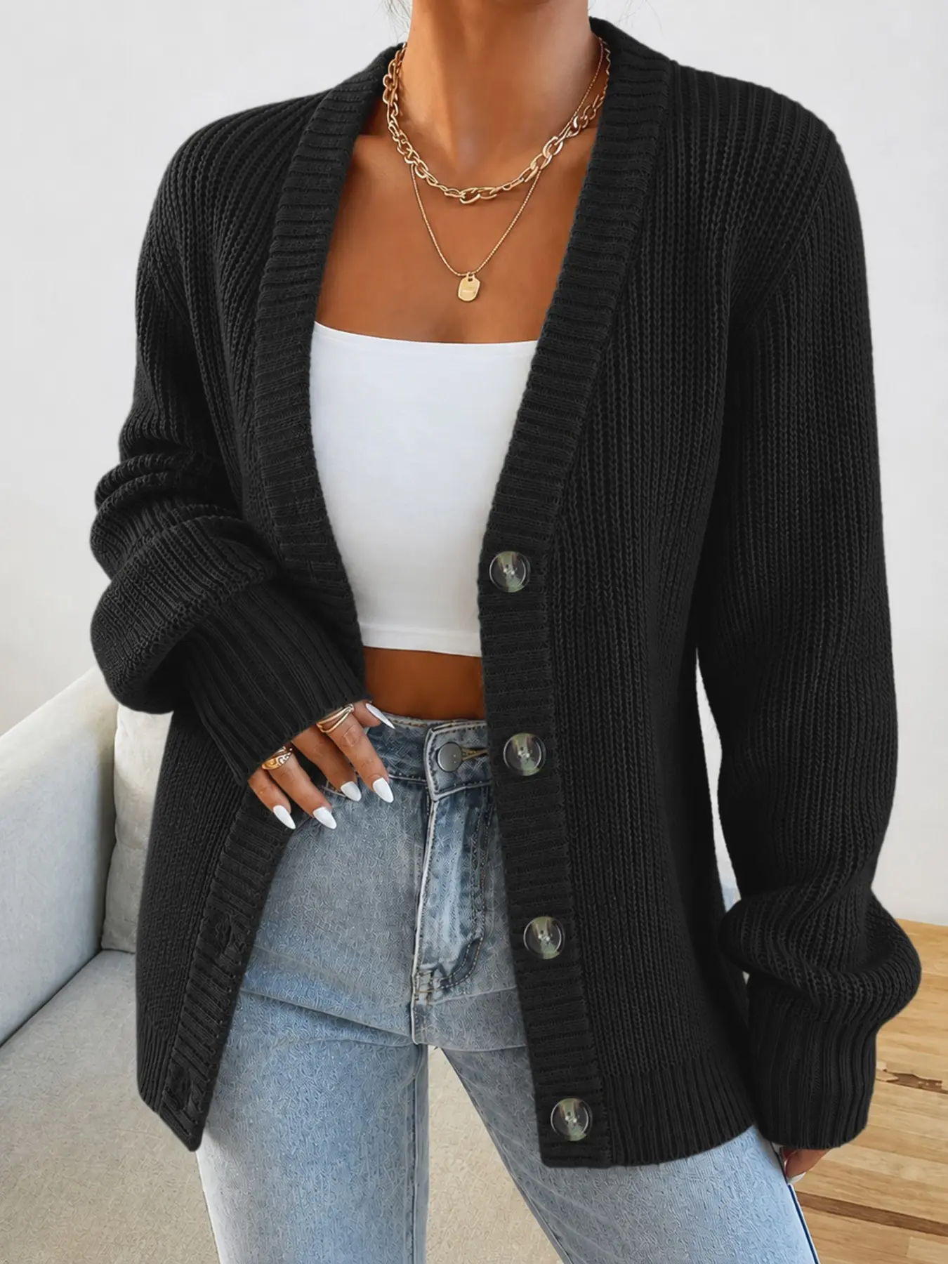 New arrival: Women's knitted cardigan, Long sleeves, soft and comfortable, with an open front button design and a relaxed, casual fit.