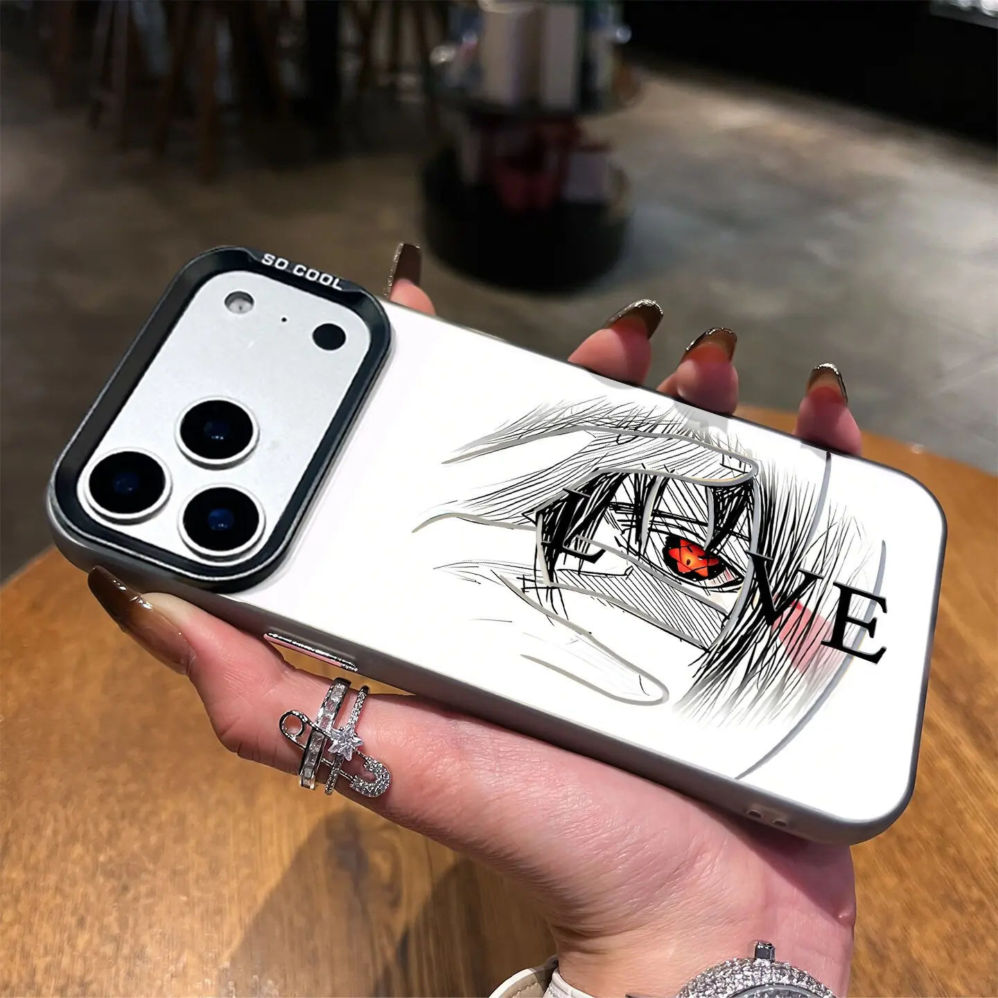 Uchiha Sasuke Sharingan Phone Case, with a shimmering effect, compatible with iPhone 11, 12, 13, 14, 15, 16 Plus, 17 Pro Max, 17 Air. Features an anime print, is shock-resistant and durable, and is made of matte acrylic—the perfect choice for anime fans