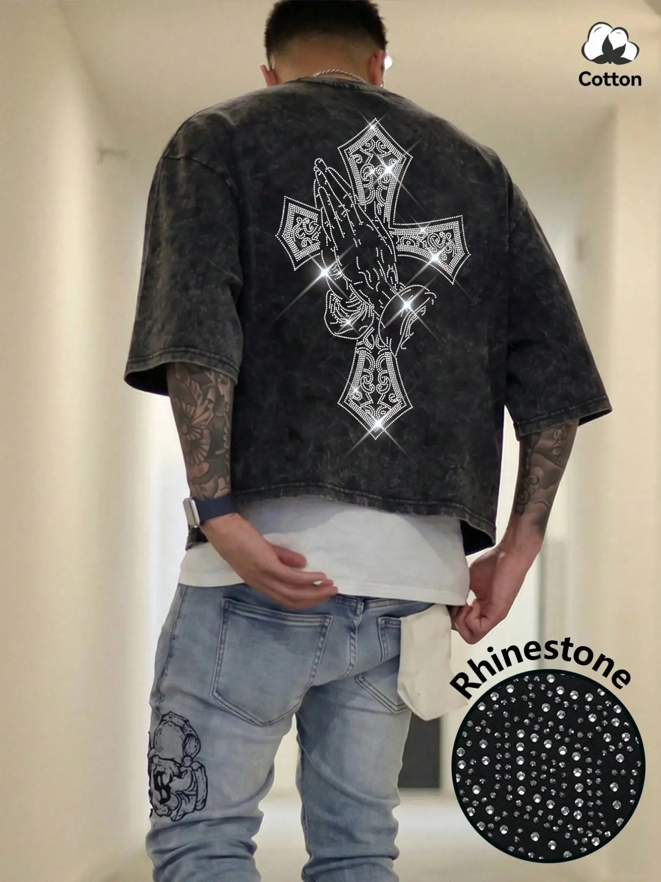 Men's washed, distressed cotton T-shirt featuring a boxy, cropped fit and a youthful, trendy crew-neck design. It showcases a rhinestone-embellished cross motif, embodying a street-style aesthetic perfect for casual daily wear or commuting. Tops