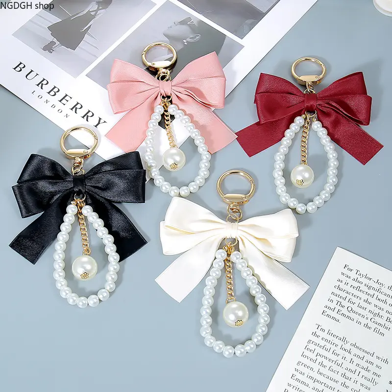 Elegant Bow Pearl Keychain for Women, Satin Ribbon Bag Charm Pendant, Faux‑Pearl Wrist Key Ring, Cute Decor Accessory for Purse Handbag Car Keys Daily Party Use