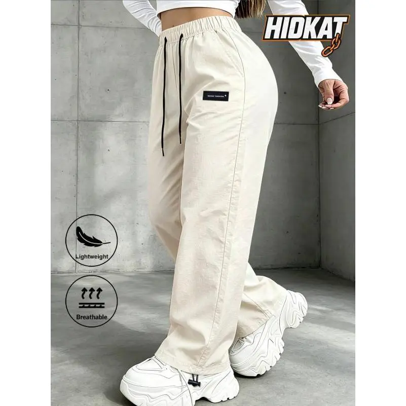 Women Roomy Wide‑Leg Street Bottoms, Stretch Waistband with Stand‑Out Black Contrast Drawcords, Ornamental Woven Label Detail, Toggle‑Modifiable Ankle Cuffs, Lightweight Crease‑Resistant Trousers for Mixed Urban Day‑to‑Day Fashion Looks