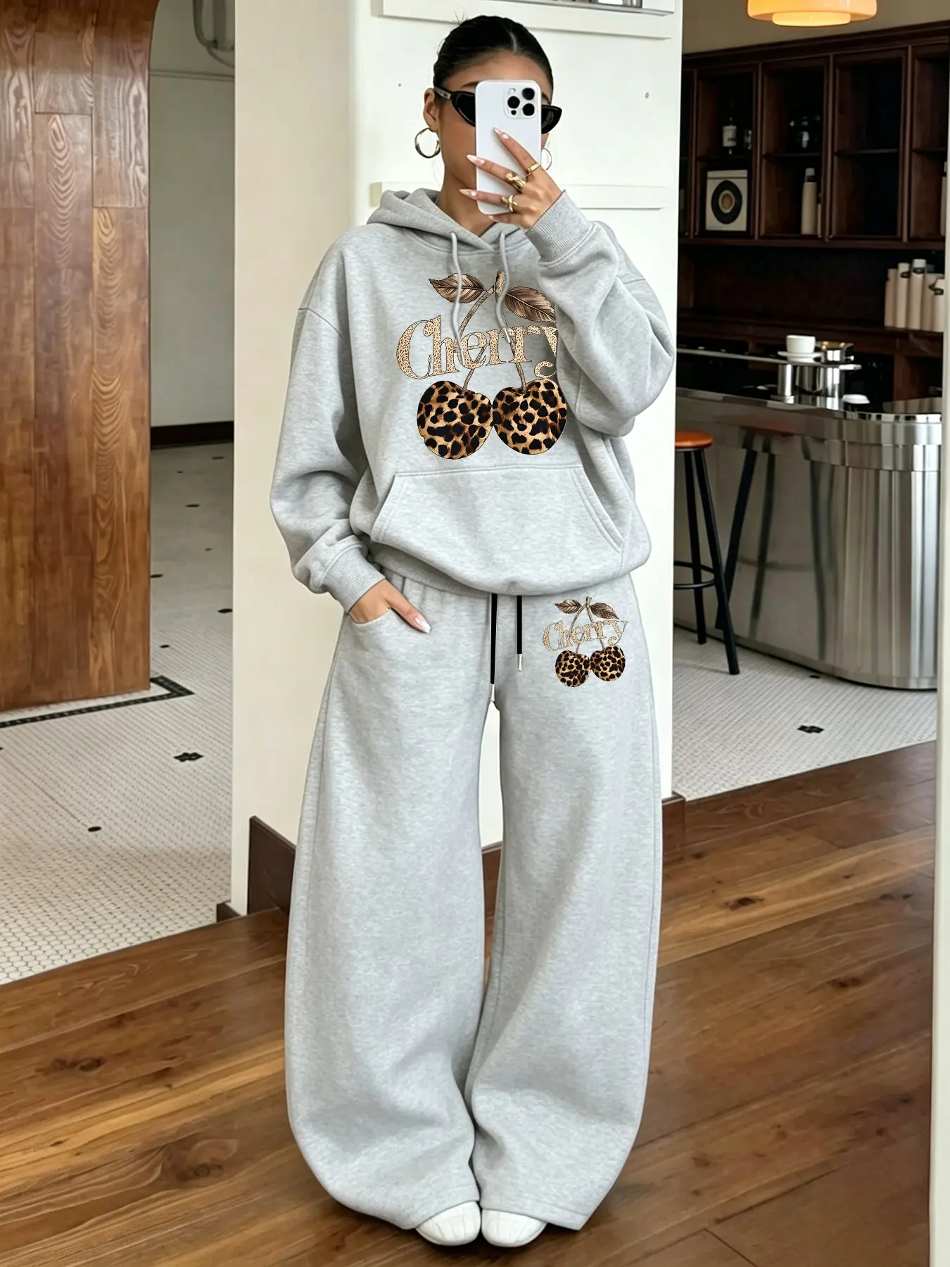 Autumn and winter fashion leopard cherry print hoodie tracksuit, made of soft fleece fabric, loose fit, suitable for everyday street commuting, sports, and casual home wear #hoodieset #sportyleisure #womensfashionset #Co-ords
