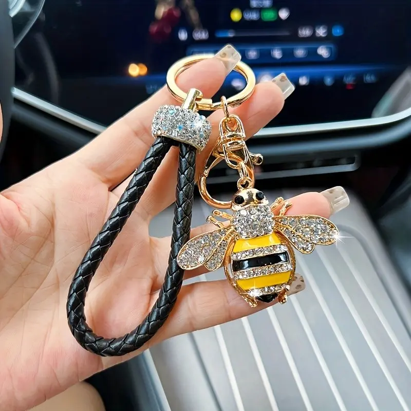 A Stylish Bee Keychain Adorned with Sparkling Artificial Diamond Accents - Featuring a Black Woven Cord, It Makes a Perfect Little Gift Suitable for Decorating Bags Or Cars, a Delightful Bee-Themed Present, Key Rings for Car Keys