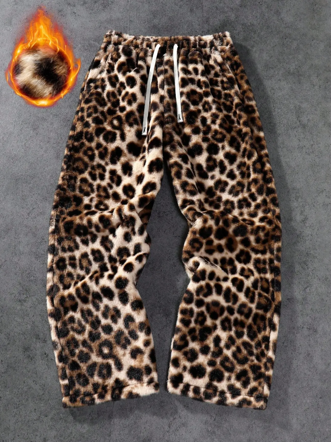 Retro leopard-print plush wide-leg pants—fleece-lined for winter warmth, featuring an elastic drawstring waist. Blending street-casual and loungewear styles, these thick, cozy pants are perfect for everyday wear or hip-hop-inspired looks.