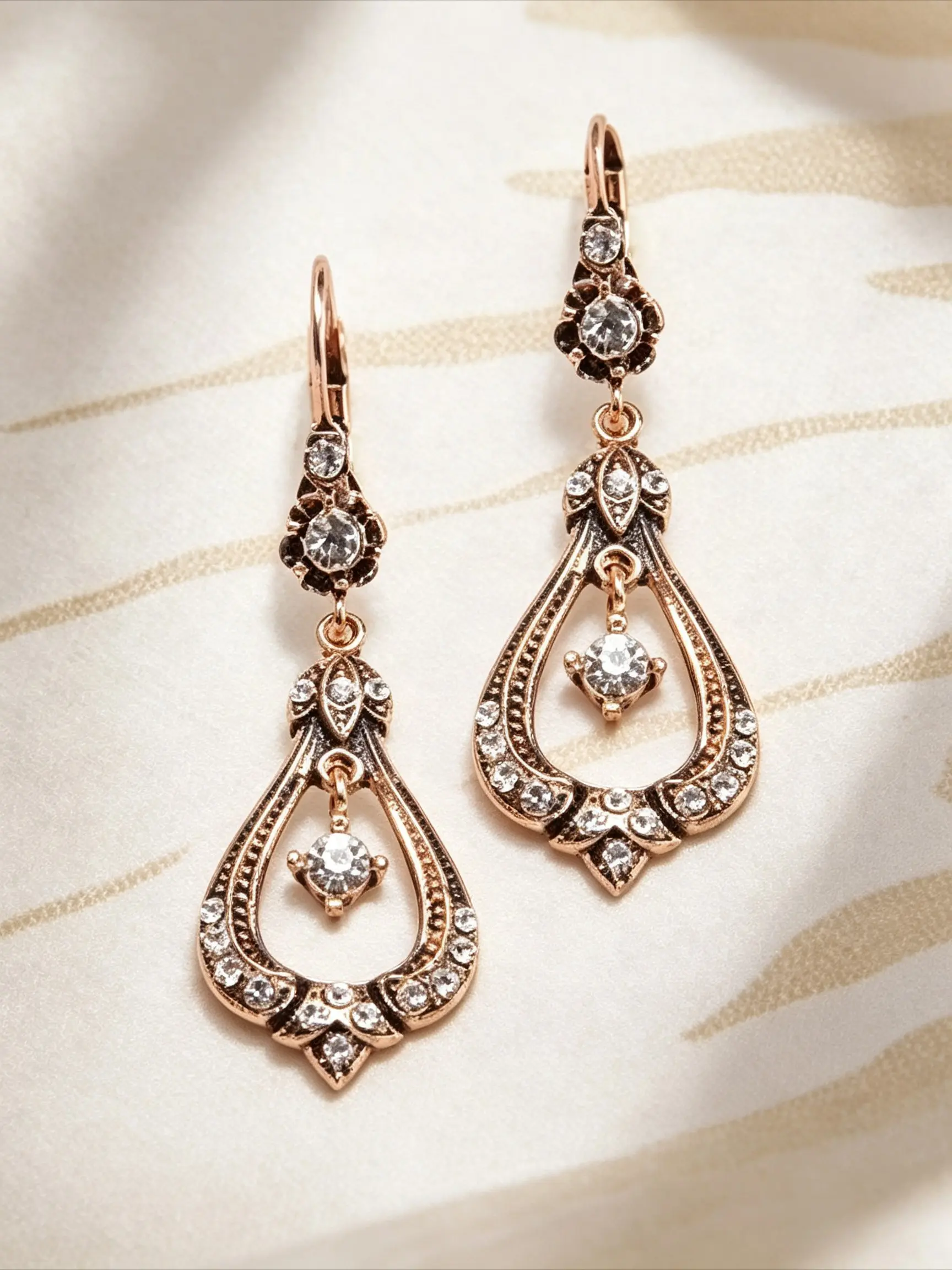 A Pair of Vintage-Style, Distressed Victorian Teardrop-Shaped Zircon Earrings for Women: Courtly-Style Earrings with a Retro Evening Gala Vibe