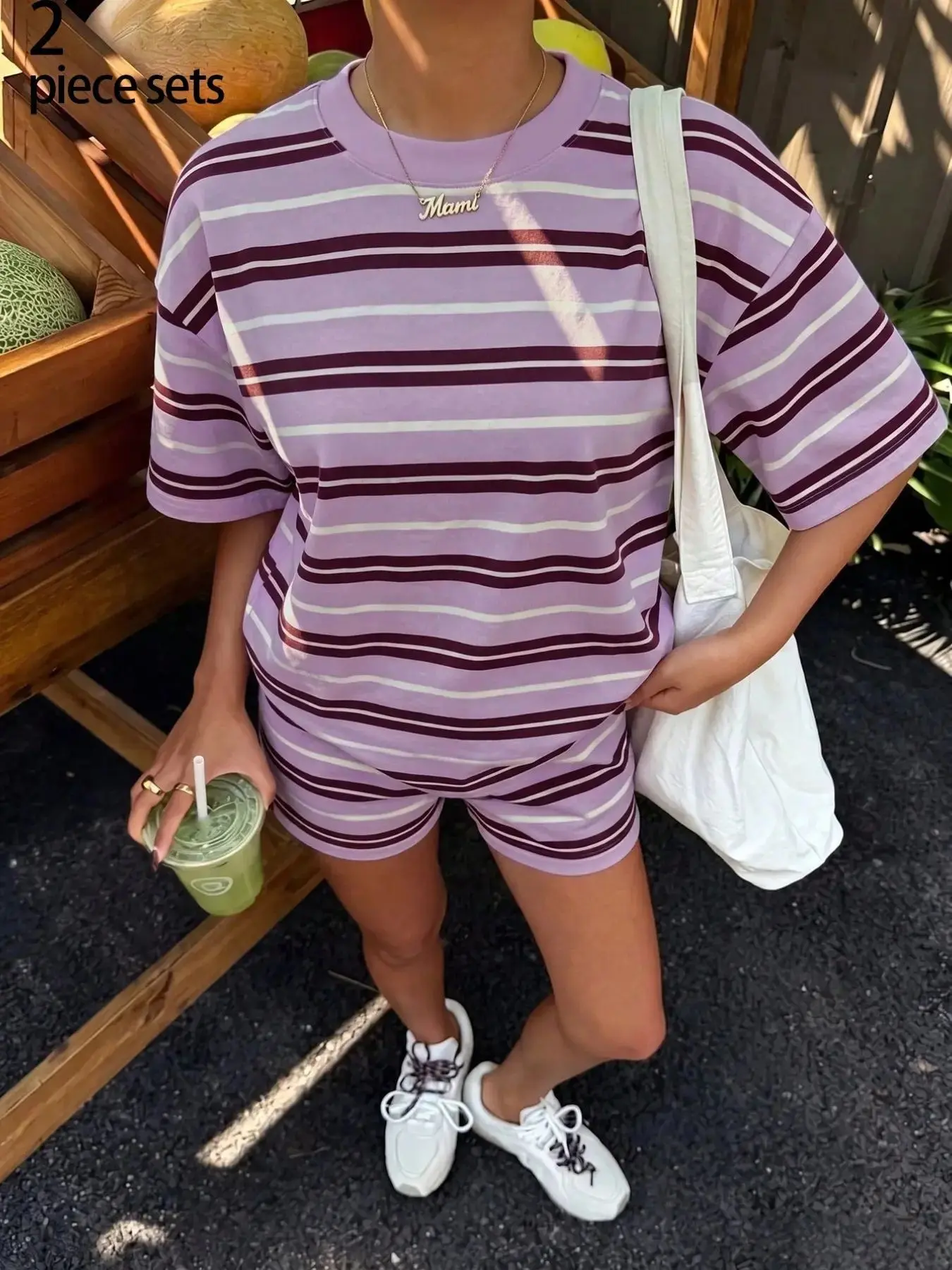 Women's two-piece loungewear set featuring a purple-maroon striped design; includes a loose, round-neck short-sleeve T-shirt and matching elastic-waist shorts—a perfect, effortless set for casual daily wear. Summer Lounge Set