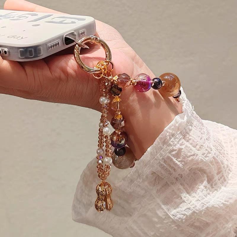 Luxurious and sophisticated mobile phone wrist strap with pink butterfly pendant, short style, niche and exquisite crystal chain, universal