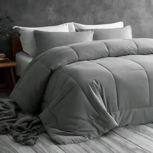 Down-alternative all-season microfiber quilted comforter; features hypoallergenic microfiber filling; breathable, lightweight, and easy-care with corner loops; machine washable; soft, lightweight, and luxurious feel; color: Smoke Gray.