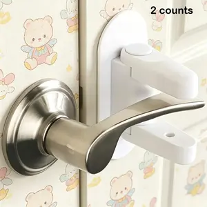 Childproof Door Lever Lock (2 Pack/Set) Prevents Toddlers Pets From Opening Doors, Door Handle Lock for Babyproofing, Durable Safe ABS Material Strong Adhesive, No Drill Tool Needed Easy to Install