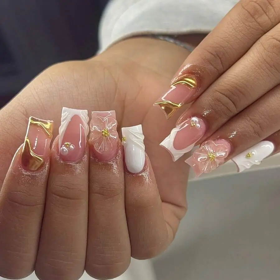 10Pcs Y2K handmade press-on nails feature nude pink bases, white French pointed tips, and transparent 3D floral ornaments accented with golden stamens.Suitable for daily wear, school, parties and more scenarios, they are ideal nail accessory gifts for wo