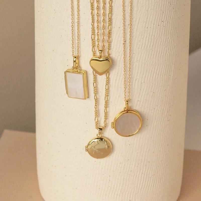 Pearl Locket Necklace by Caitlyn Minimalist.
